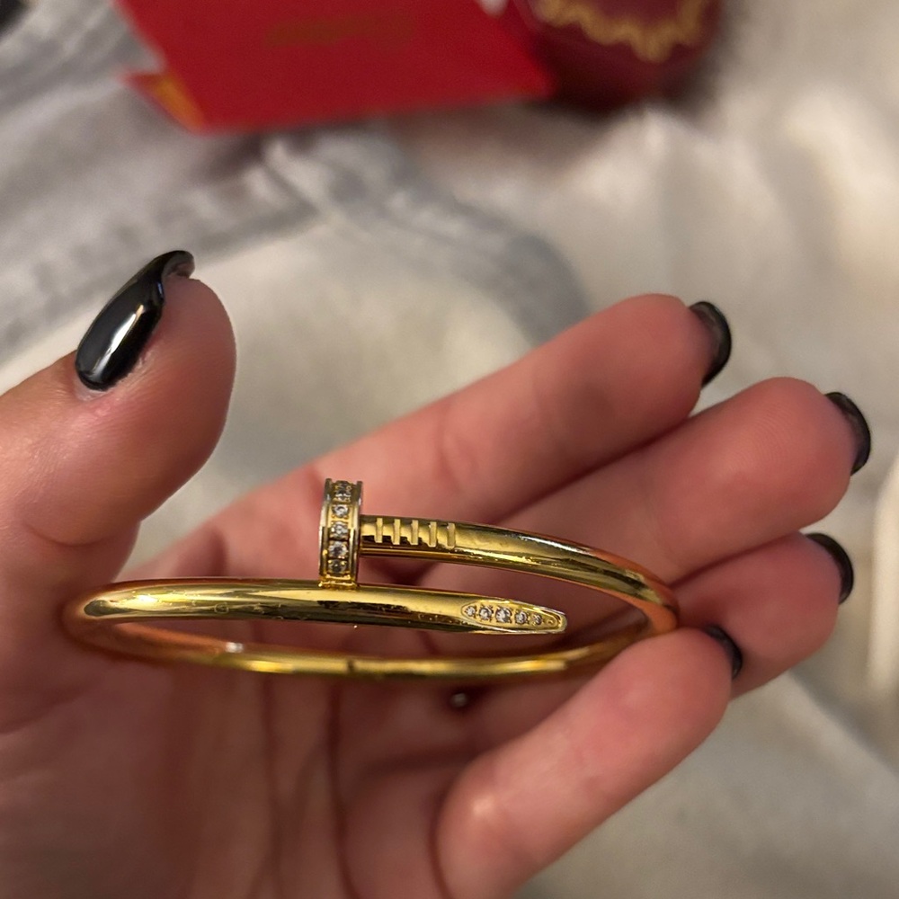 Gold nail bracelet